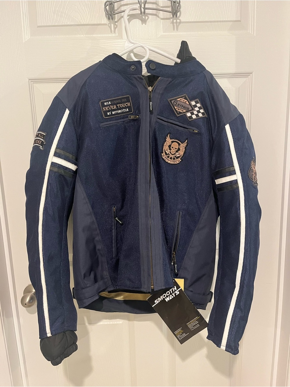 Men’s Gryphon blue padded Motorcycle Jacket new w/ tags size XL.